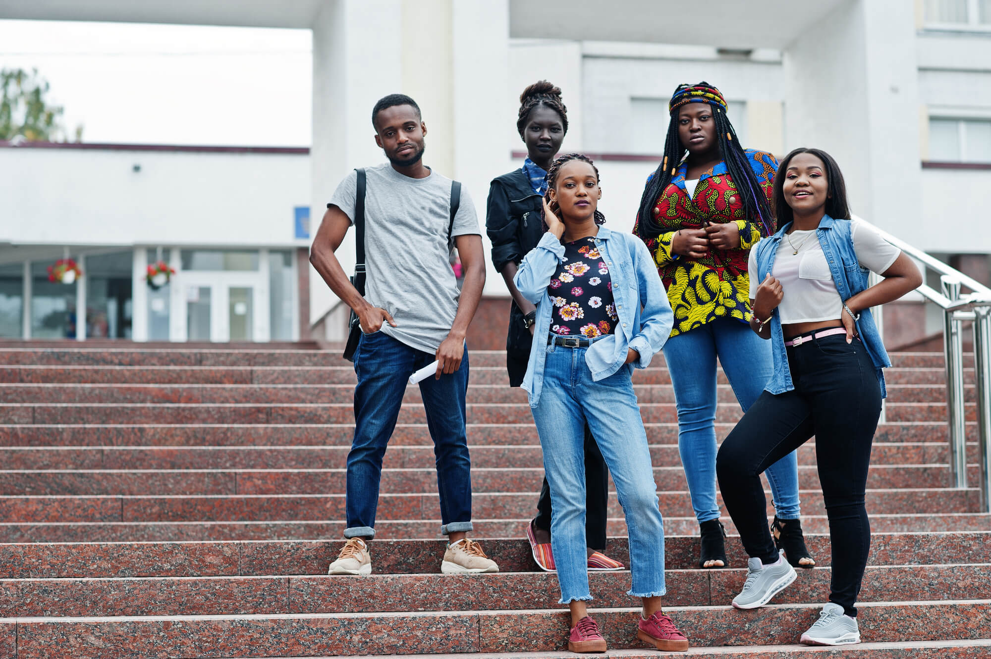 group-five-african-college-students-spending-time-together-campus-university-yard-black-afro-friends-studying-education-theme (1)